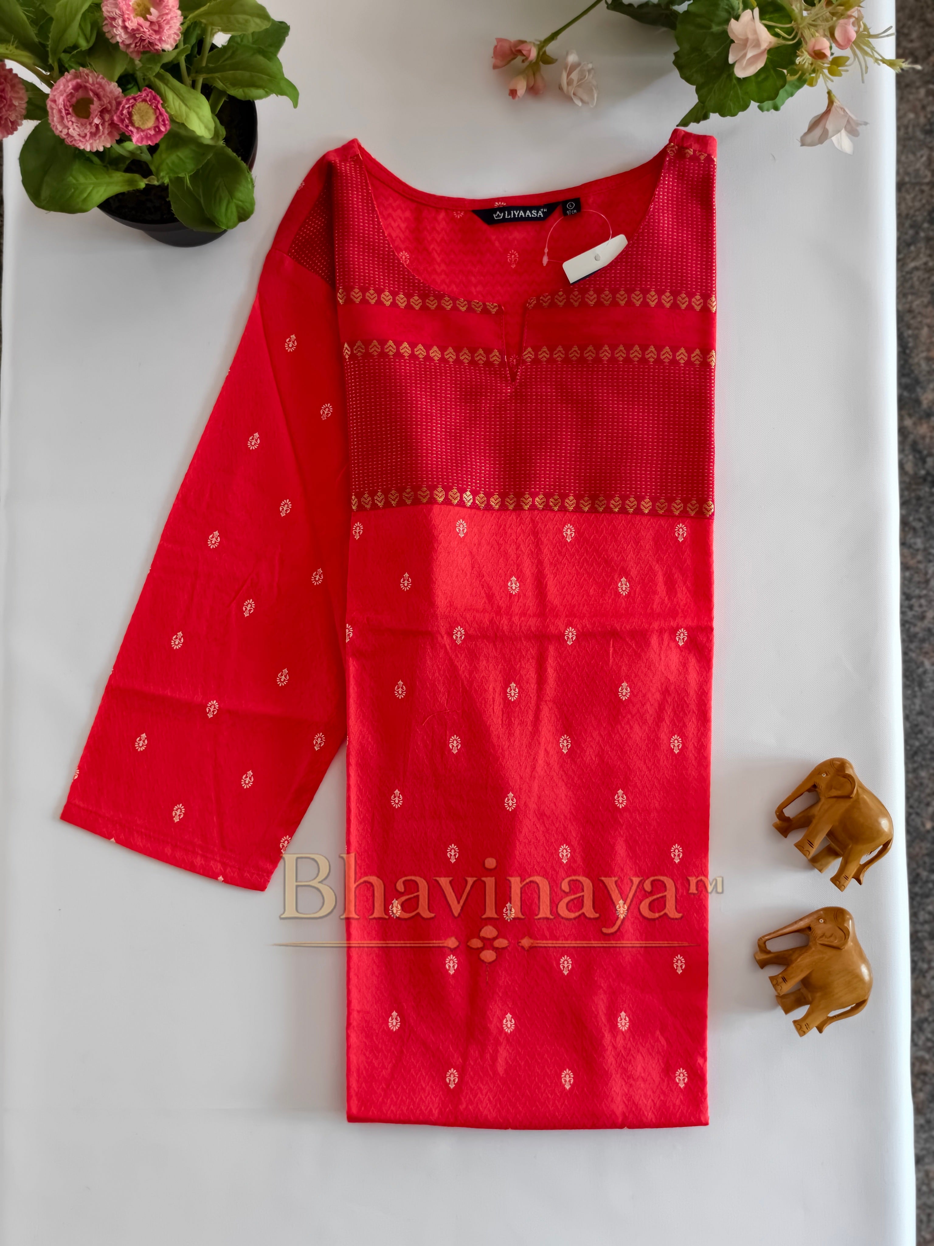 Pink buti kurthi with kasavu yoke